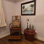 3-bedroom sea view condo near CoCo Pier in Panwa, Phuket reading corner with Chinese figurines PSC-PAN-1550