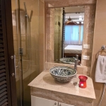 3-bedroom sea view condo near CoCo Pier in Panwa, Phuket bathroom with round patterned porcelain sink and shower PSC-PAN-1550
