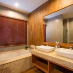 3-bedroom pool villa in Soi Naya near Nai Harn Beach, Phuket bathroom with double sink and bathtub PSV-NAH-1531