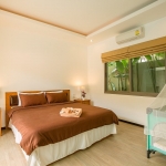 3-bedroom pool villa in Soi Naya near Nai Harn Beach, Phuket bedroom wtih baby cot PSV-NAH-1531