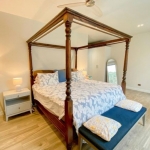 3-bedroom villa in Rawai, Phuket bedroom with 4-poster wooden bed PSV-RAW-1546