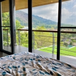 3 villas and 1 apartment hillside estate in Nai Harn, Phuket bedroom with terrace overlooking roofdeck PSV-NAH-1542