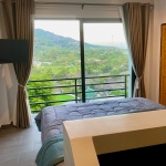 3 villas and 1 apartment hillside estate in Nai Harn, Phuket bedroom with balcony and mountain view PSV-NAH-1542