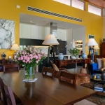 4-5 bedroom villa with large pool near Bang Tao Beach, Phuket living area with yellow walls PSV-BAN-1528 ALT text