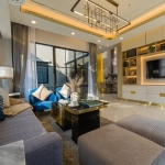 4-bedroom pool villa right next to BISP in Koh Kaew, Phuket living room with tv PSV-KOH-1541