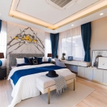 4-bedroom pool villa right next to BISP in Koh Kaew, Phuket bedroom with work table and blue curtains PSV-KOH-1541