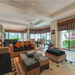 4-bedroom golf course view pool villa in Laguna, Phuket living are with floor to ceiling glass sliding doors and pool access PSV-LAG-1548