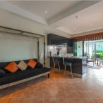4-bedroom golf course view pool villa in Laguna, Phuket daybed and kitchen on terracotta floor tiles PSV-LAG-1548