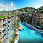 1-2 bedroom condos for sale walk to Patong Beach, Phuket view of development with balconies and central pool PSC-PAT-1564