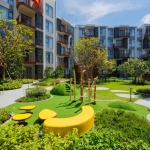 1-2 bedroom condos & penthouses in the Laguna Area, Phuket exterior view of development and playground PSC-CHE-1560