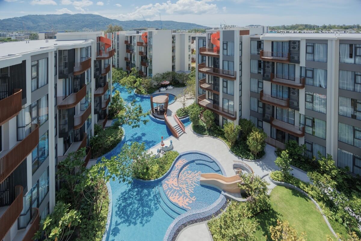 1-2 bedroom condos & penthouses in the Laguna Area, Phuket exterior view of development and lagoon pool PSC-CHE-1560