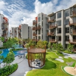 1-2 bedroom condos & penthouses in the Laguna Area, Phuket exterior view of development with pool and playground PSC-CHE-1560