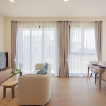 1-2 bedroom condos & penthouses in the Laguna Area, Phuket living and dining area in beige PSC-CHE-1560