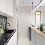 1-2 bedroom condos for sale near Porto de Phuket in Cherng Talay kitchen with washing machine and fridge PSC-CHE-1578