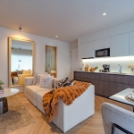 1-3 bedroom condos near Bang Tao Beach, Phuket open plan living, dining and kitchen area view towards bedroom PSC-BAN-1559