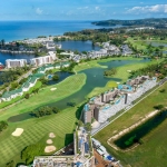 2–3 bedroom condos & penthouses in Laguna, Phuket aerial view of the development facing the golf course and lagoons PSC-LAG-1566