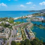2–3 bedroom penthouses in Laguna, Phuket aerial view of the development with the ocean in the background PSC-LAG-1567