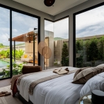 3-4 bedroom pool villas in Soi Naya near Nai Harn Beach, Phuket open bedroom with floor to ceiling glass walls and doors overlooking lotus pond PSV-NAH-1569