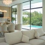 3-bedroom modern pool villa near Lotus’s in Chalong, Phuket open plan living, dining and kitchen area with pool access PSV-CHA-1579