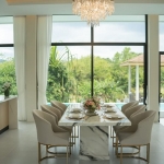 3-bedroom modern pool villa near Lotus’s in Chalong, Phuket 6-seater marble dining table with chandelier and pool view PSV-CHA-1579