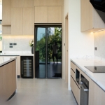3-bedroom modern pool villa near Lotus’s in Chalong, Phuket kitchen with oak wood panelling PSV-CHA-1579