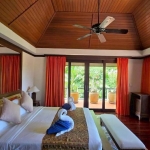 3-bedroom pool villa near Kata Beach, Phuket bedroom with vaulted ceilings and orange cutains PSV-KAT-1553