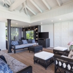 5-bedroom sea view pool villa near Surin Beach, Phuket living room with tv and home office in the back PSV-SUR-1557