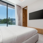 5-bedroom pool villa near Nai Harn Beach in Rawai, Phuket bedroom with tv and sliding doors PSV-NAH-1577