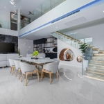 5-bedroom pool villa near Nai Harn Beach in Rawai, Phuket dining area and stairs leading to upper floor PSV-NAH-1577