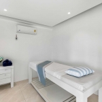 6-bedroom beachfront pool villa on Natai Beach, white room with massage bed PSV-PHA-1565