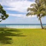 6-bedroom beachfront pool villa on Natai Beach, manicured lawn with white picket fence by the beach PSV-PHA-1565