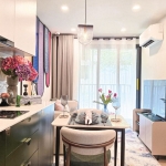 1-2 bedroom & plus condos adjacent to HomePro in Cherng Talay, Phuket open plan living, dining and kitchen area with balcony PSC-CHE-1599