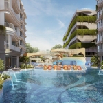 1-bedroom condos near Kamala Beach, Phuket lagoon pool and loungers in the middle of condo buildings PSC-KAM-1592
