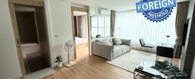 1-bedroom condo for sale 400m to Kalim Beach, Phuket living area and doors to bathroom and bedroom PSC-KAL-1591