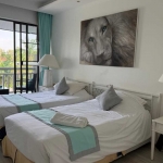 2-bedroom condo in Laguna Phuket all white twin bedroom with balcony PSC-LAG-1598