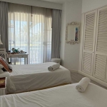 2-bedroom condo in Laguna Phuket all white twin bedroom PSC-LAG-1598