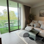 2-bedroom condo near Laguna Beach in Bang Tao, Phuket living area with balcony PSC-BAN-1595