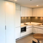2-bedroom condo near Laguna Beach in Bang Tao, Phuket kitchen with white cabinets PSC-BAN-1595