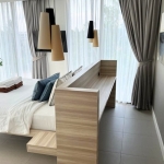 2-bedroom condo near Laguna Beach in Bang Tao, Phuket bedroom with headboard table PSC-BAN-1595
