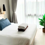2-bedroom condo near Laguna Beach in Bang Tao, Phuket bedroom with sheer white curtain PSC-BAN-1595