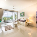 2-bedroom condo near Surin and Bang Tao Beach living room and terrace PSC-SUR-1606