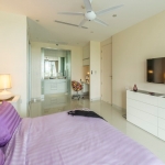 2-bedroom condo near Surin and Bang Tao Beach all white bedroom with purple bedding and tv PSC-SUR-1606