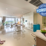 2-bedroom condo near Surin and Bang Tao Beach dining and living area with terrace PSC-SUR-1606