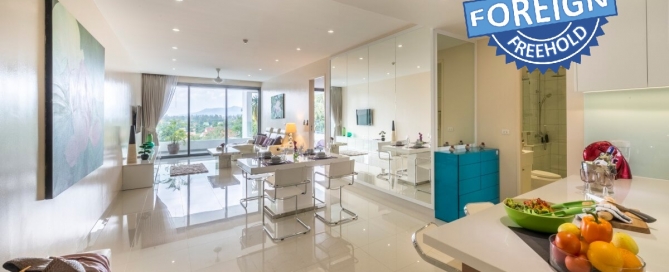 2-bedroom condo near Surin and Bang Tao Beach dining and living area with terrace PSC-SUR-1606