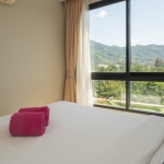 2-bedroom condo near Bang Tao Beach, Phuket bedroom with sheer mountain view PSC-BAN-1597