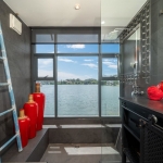 2-bedroom duplex condo in Laguna, Phuket lakeview bathroom with red accents PSC-LAG-1594
