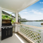 2-bedroom duplex condo in Laguna, Phuket covered terrace with barbeque grill overlooking the lake PSC-LAG-1594