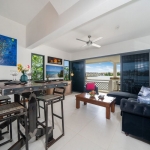 2-bedroom duplex condo in Laguna, Phuket living and dining area with lakeview PSC-LAG-1594