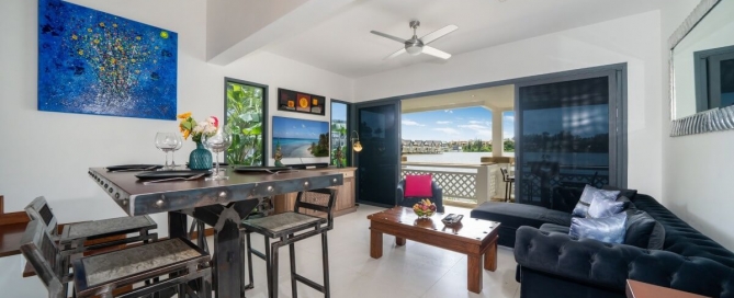 2-bedroom duplex condo in Laguna, Phuket living and dining area with lakeview PSC-LAG-1594