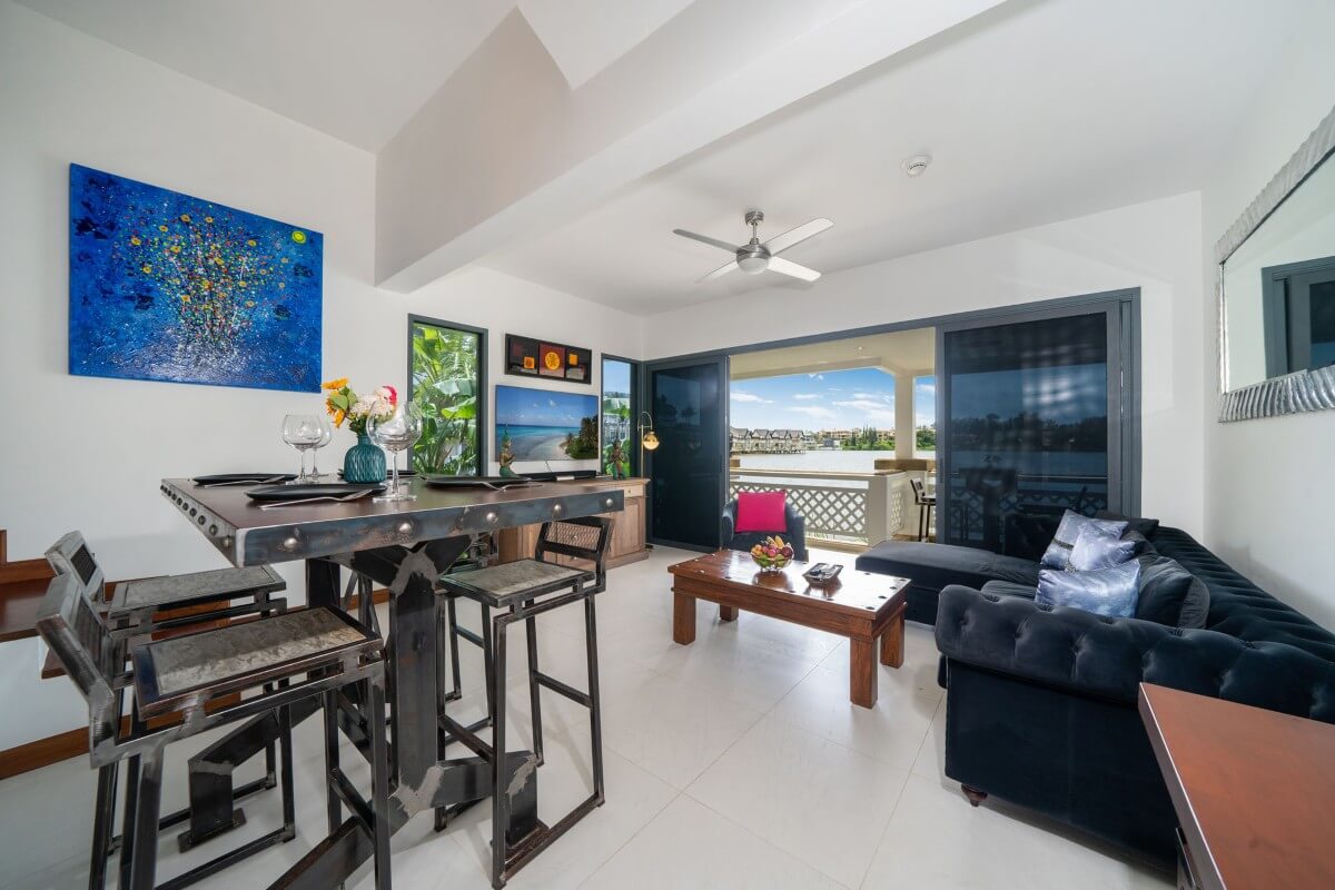 2-bedroom duplex condo in Laguna, Phuket living and dining area with lakeview PSC-LAG-1594